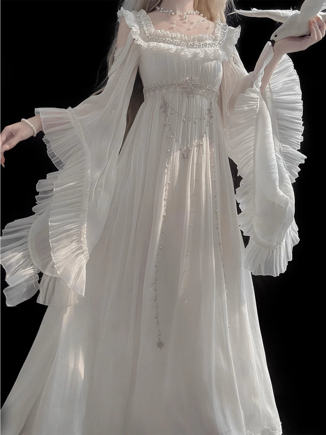 Front view of white Empire Lolita off-shoulder one-piece dress with decorative waist chain