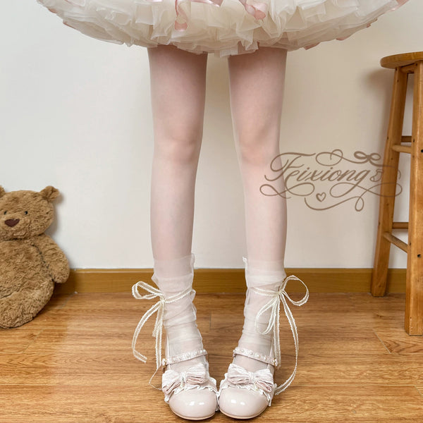 Milky yellow sheer lolita mid-calf sock with bunny ear bow and lace trim