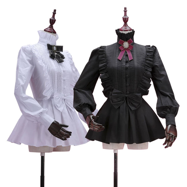 Black and white cotton blouses with accordion pleats, ruffled collars, lantern sleeves, and waist bows
