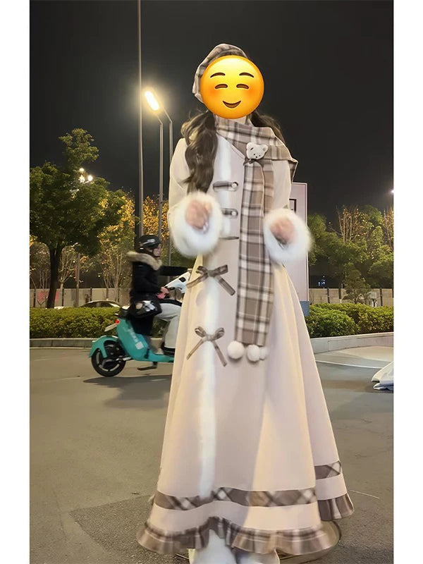 Model wearing a khaki three-piece set with plaid scarf, paneled jacket and mid-length flared skirt at night