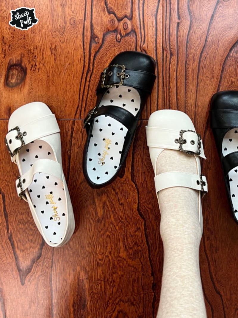 Curly sheep puff Mary Jane shoes by Sheep Puff featuring plush sheep design and classic black Mary Jane style.
