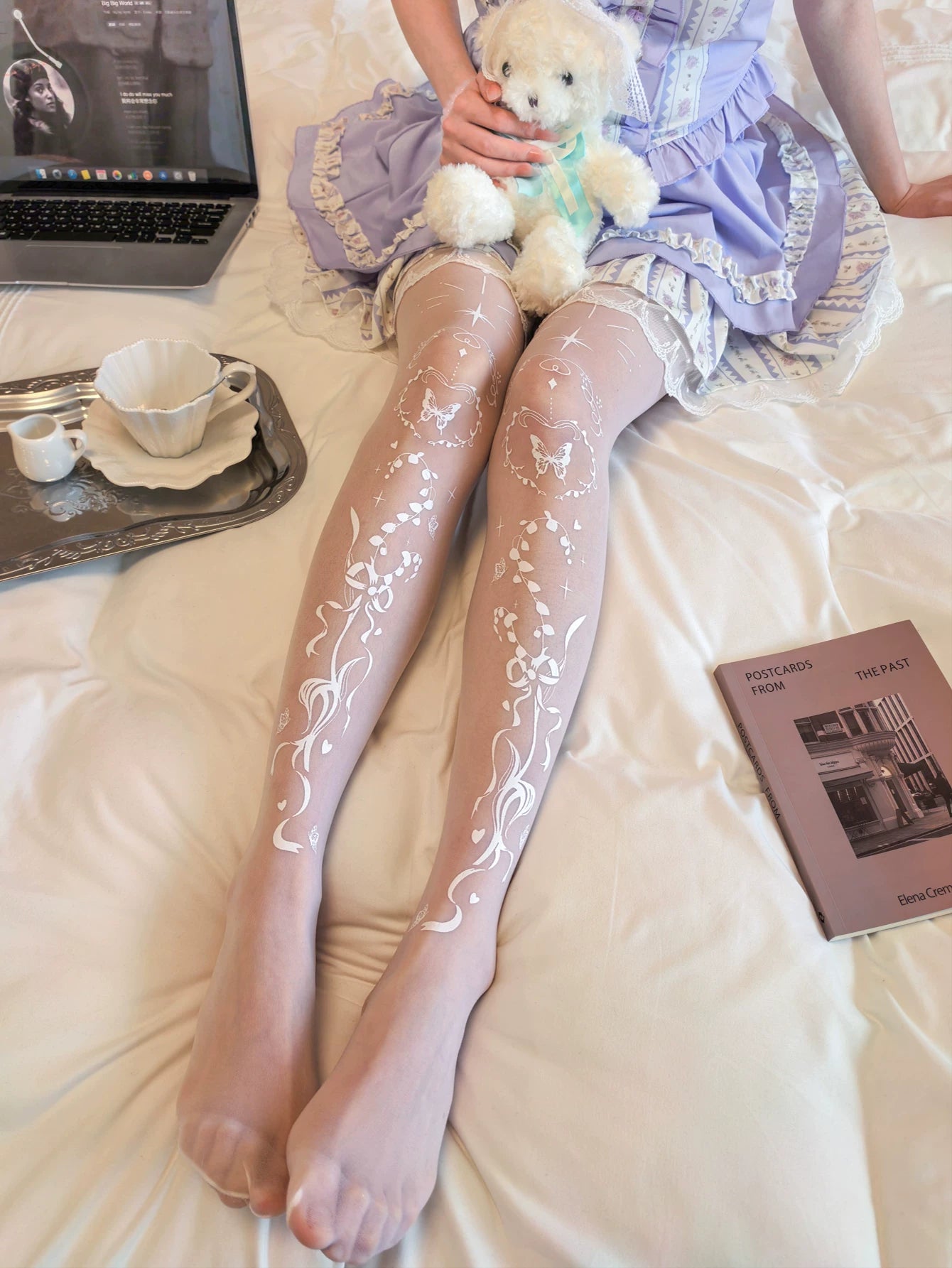 White printed pantyhose with butterfly, heart and floral motifs