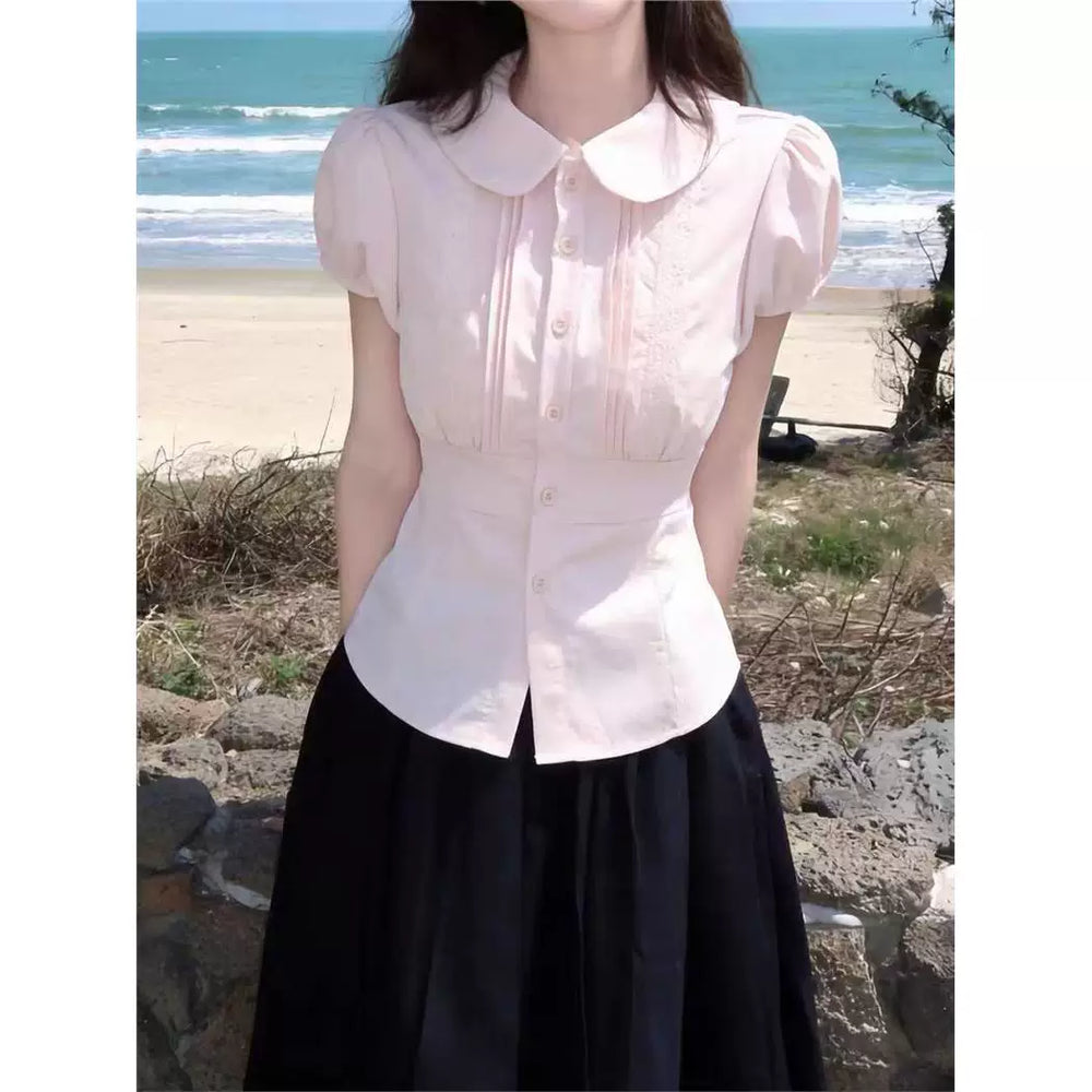 Pink short-sleeve doll-collar blouse with lace front panels