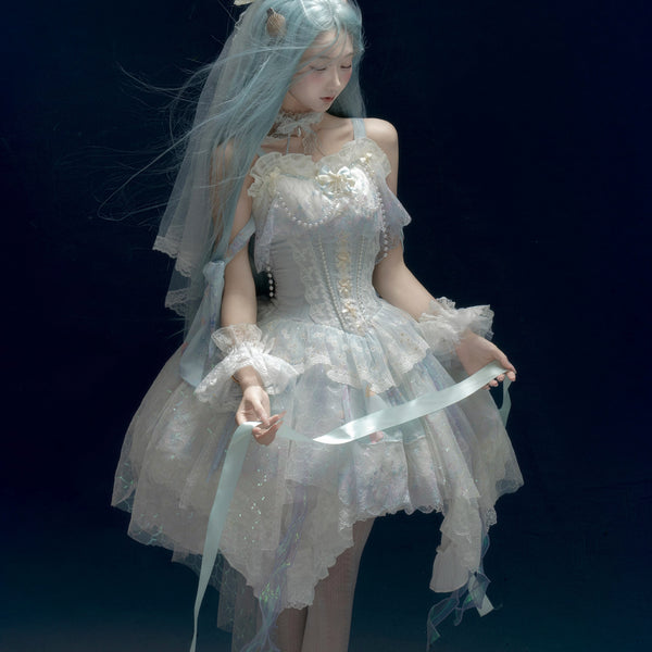 Pale blue lace JSK with veil and pearl details worn in an editorial setting