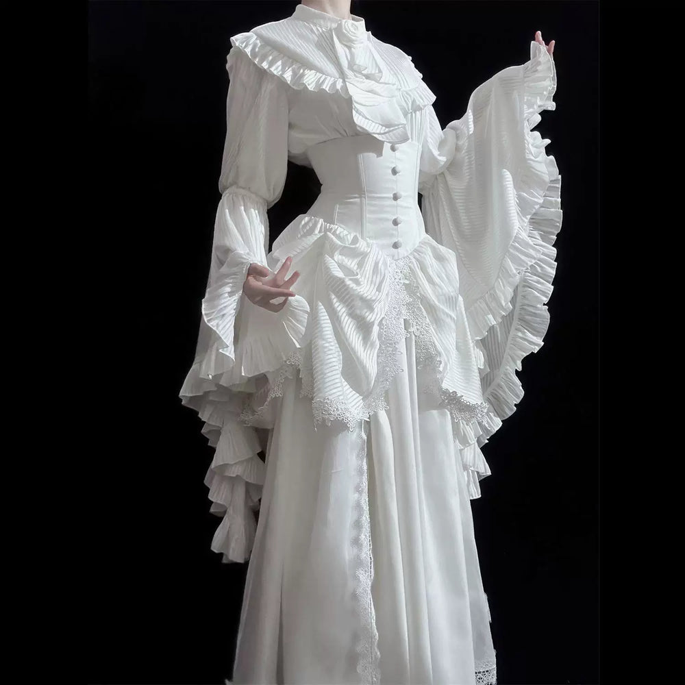 White ruffled gothic blouse and long skirt set with corset-style waist panel