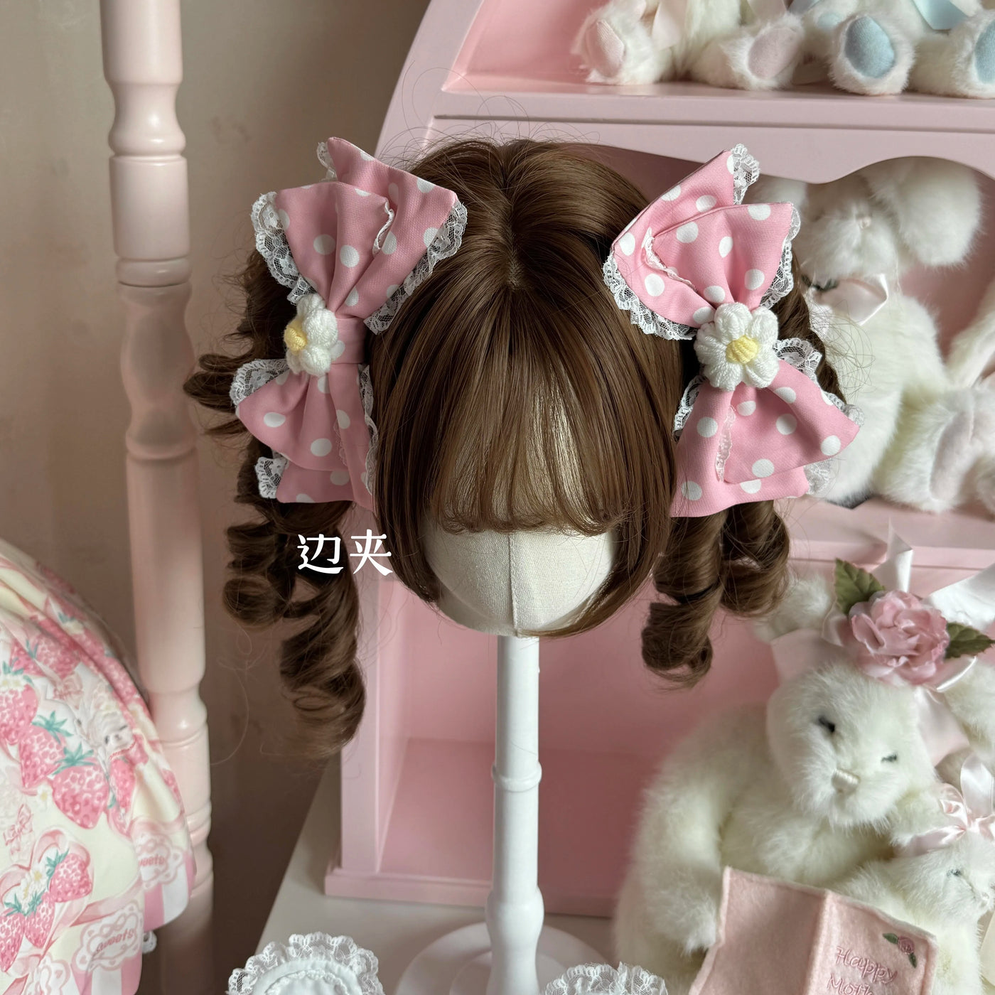 Pastel pink and white polka dot bow side hair clip with white lace trim and daisy accents