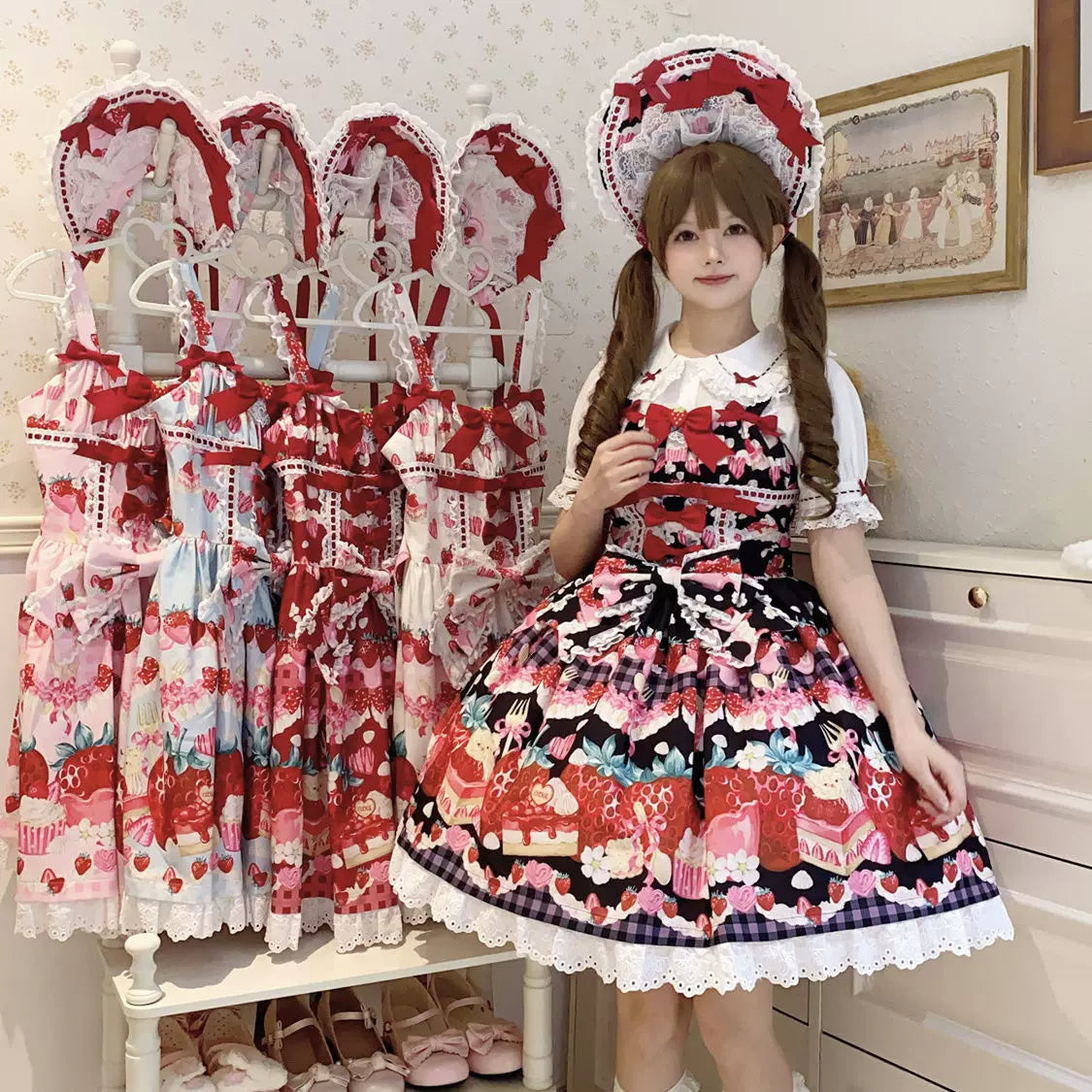 Lady Han Sweet Berry Love JSK dress by Lolita Fetch featuring a pink and berry print, with a fitted bodice and flowing skirt.