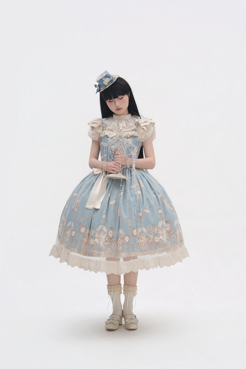Pale purple unicorn-print JSK dress styled on a model with a wide waist bow