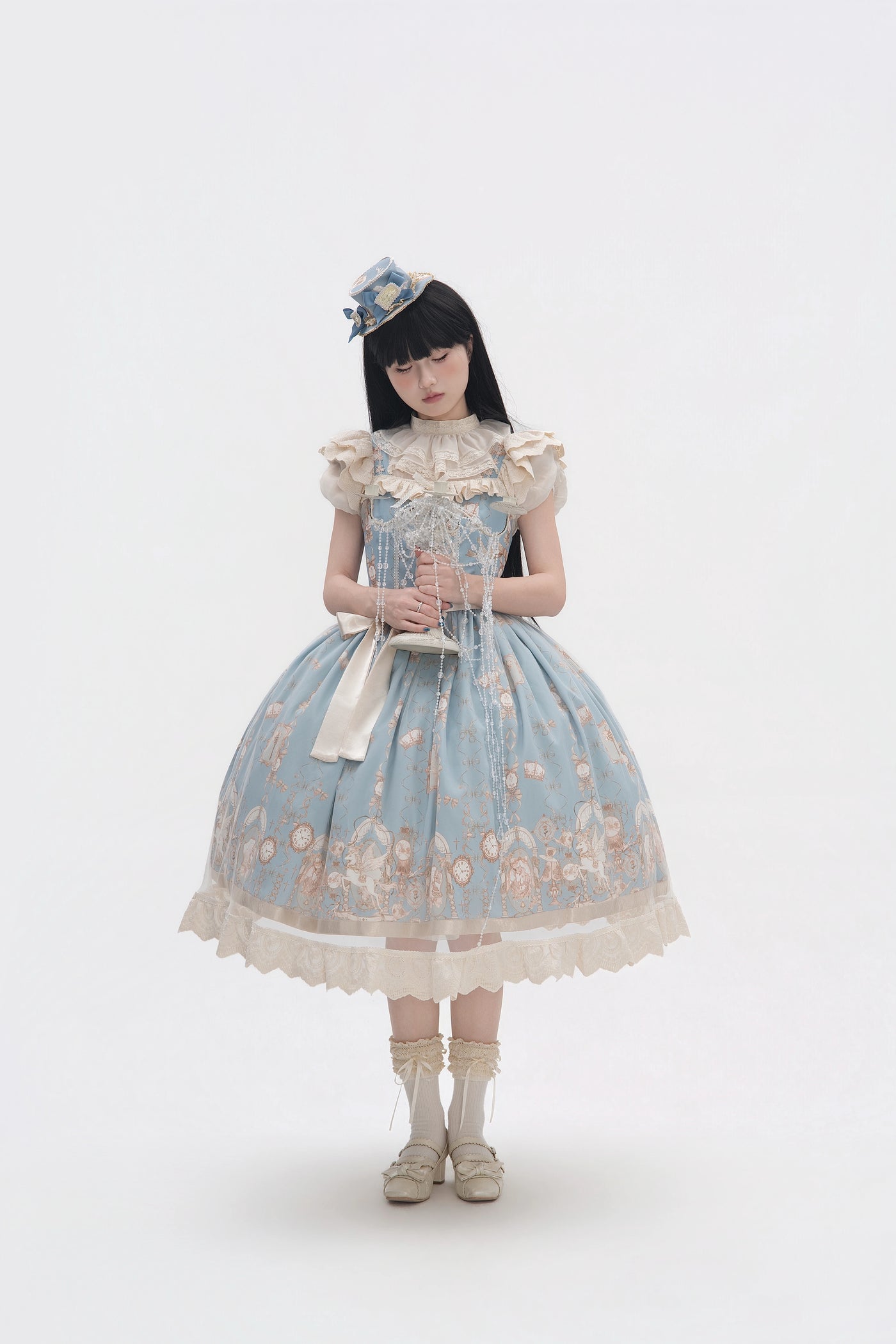 Pale purple unicorn-print JSK dress styled on a model with a wide waist bow