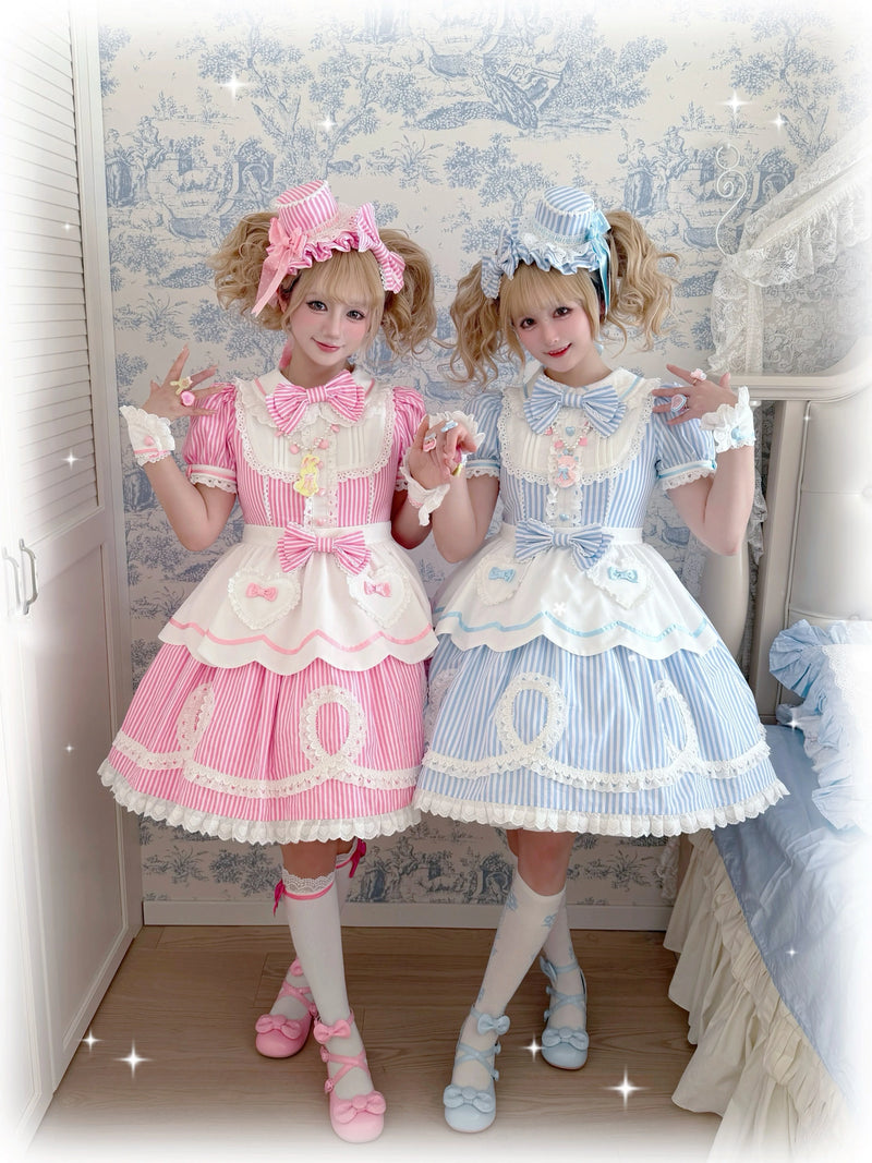 Red Sweet Lolita OP dress with white polka dots, lace trim, and heart appliqués on the apron front