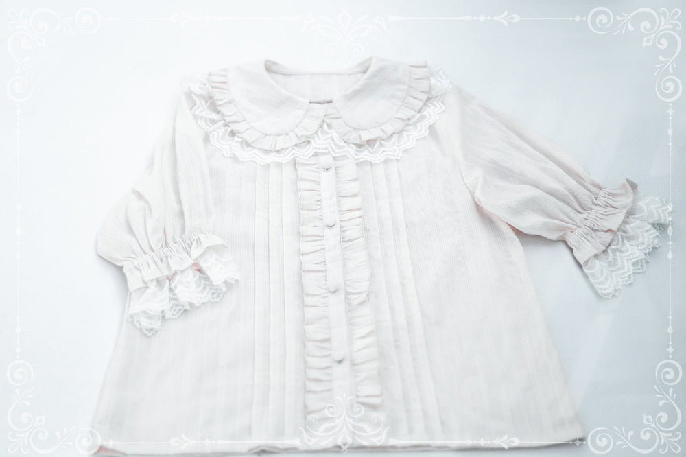 White short-sleeve Lolita shirt with a ruffled collar and front placket