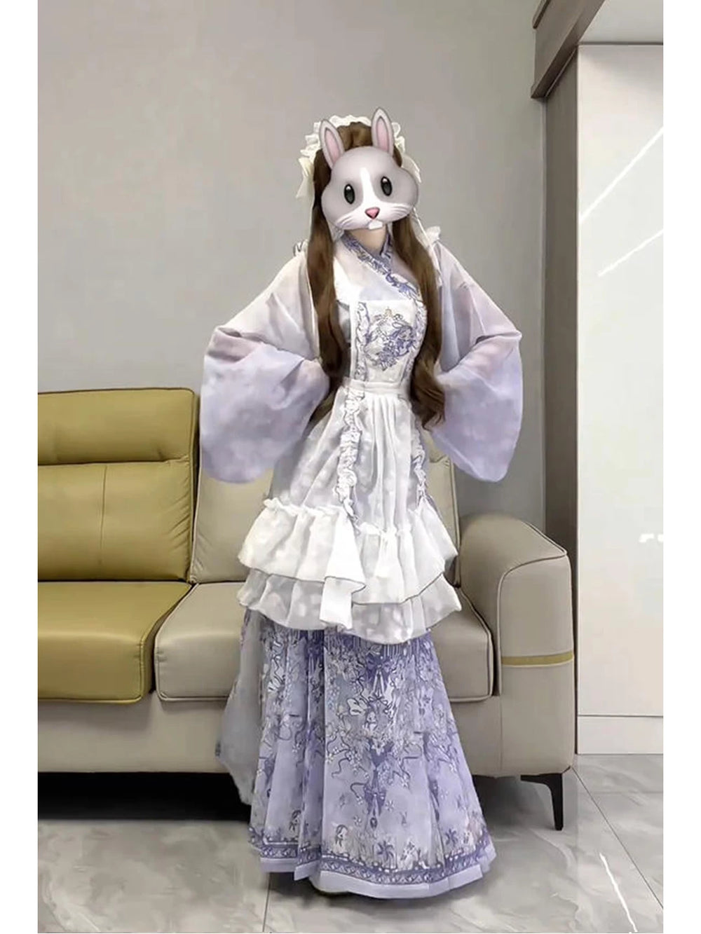 Full-length view of a purple-and-white Hanfu-Lolita set with wide sleeves and layered skirt; the face is covered.
