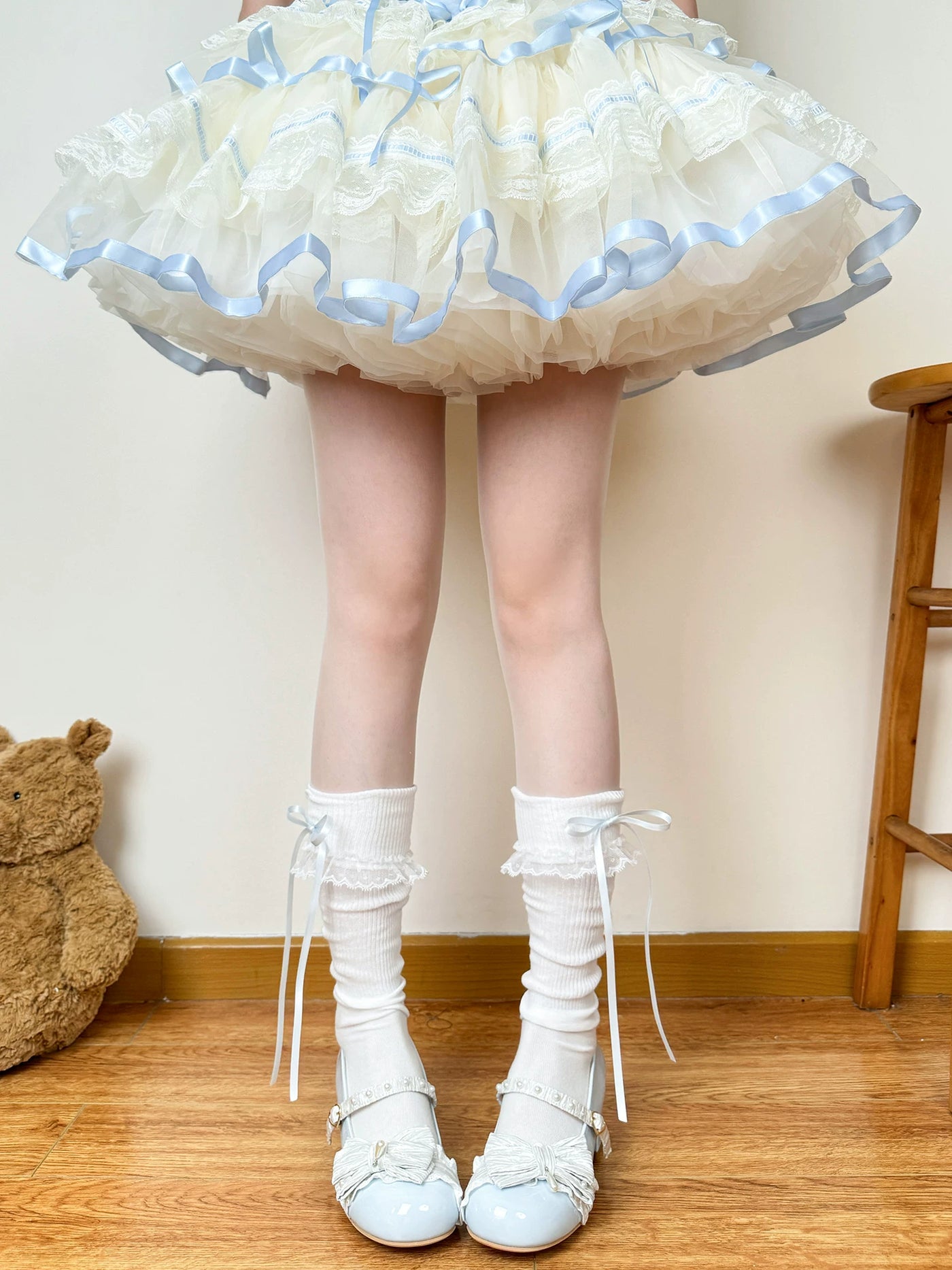 Scrunch socks with gathered legs and ribbon bows in black and white colourways