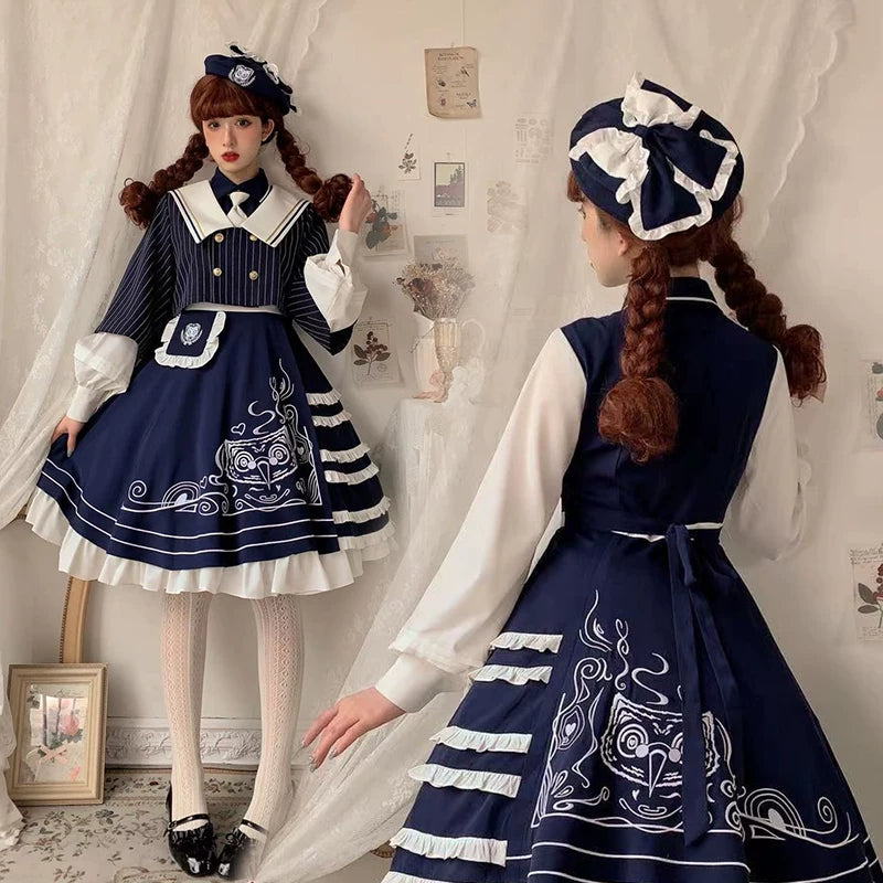 Navy and white sailor Lolita one-piece dress with gold-tone buttons and tiered skirt