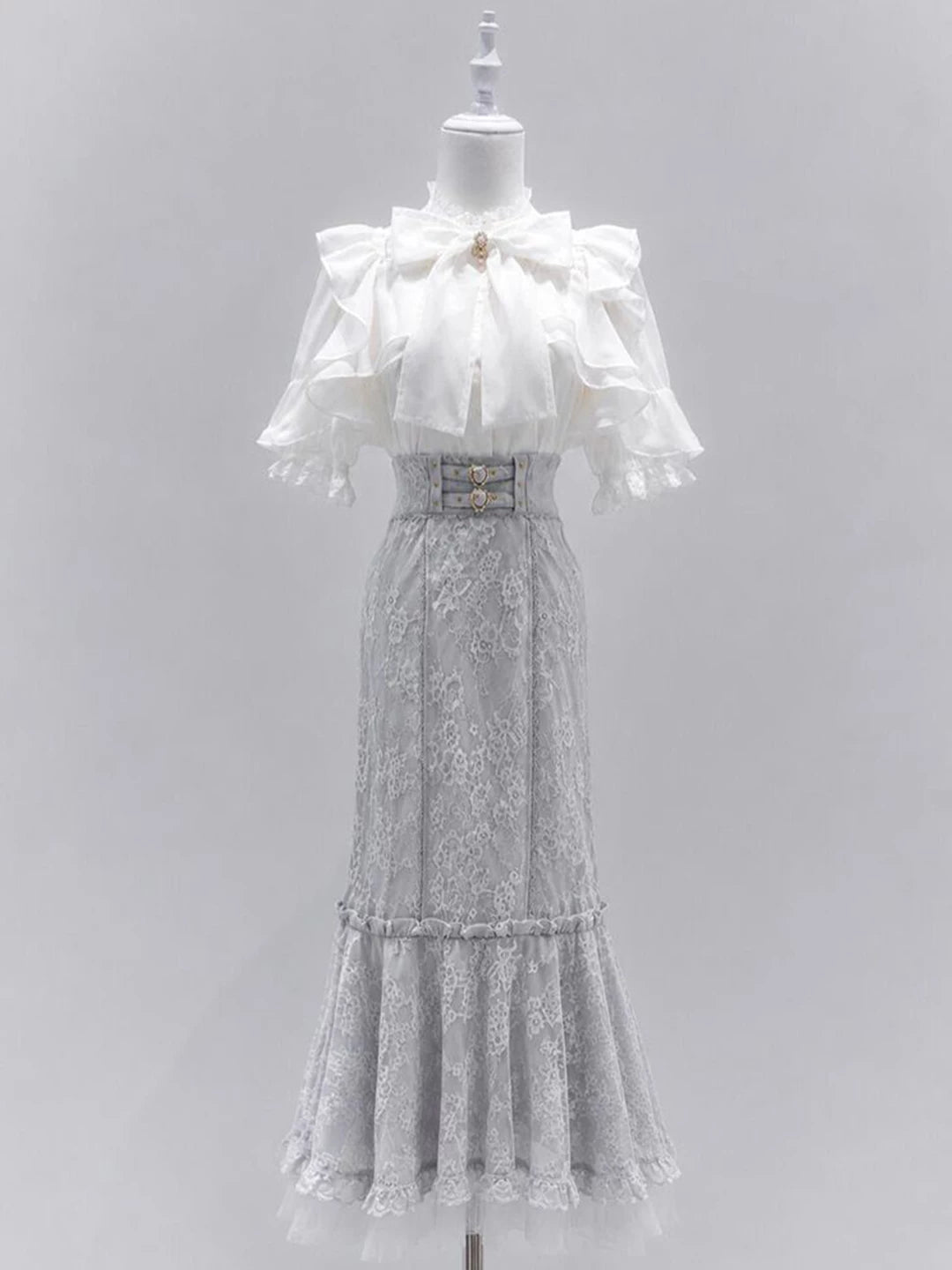 Classic Lolita white blouse and light blue fishtail skirt set with lace, bow, and brooch details