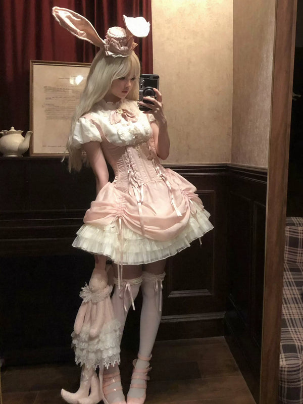 Modelled pink Gothic JSK dress set with a rabbit-ear hat
