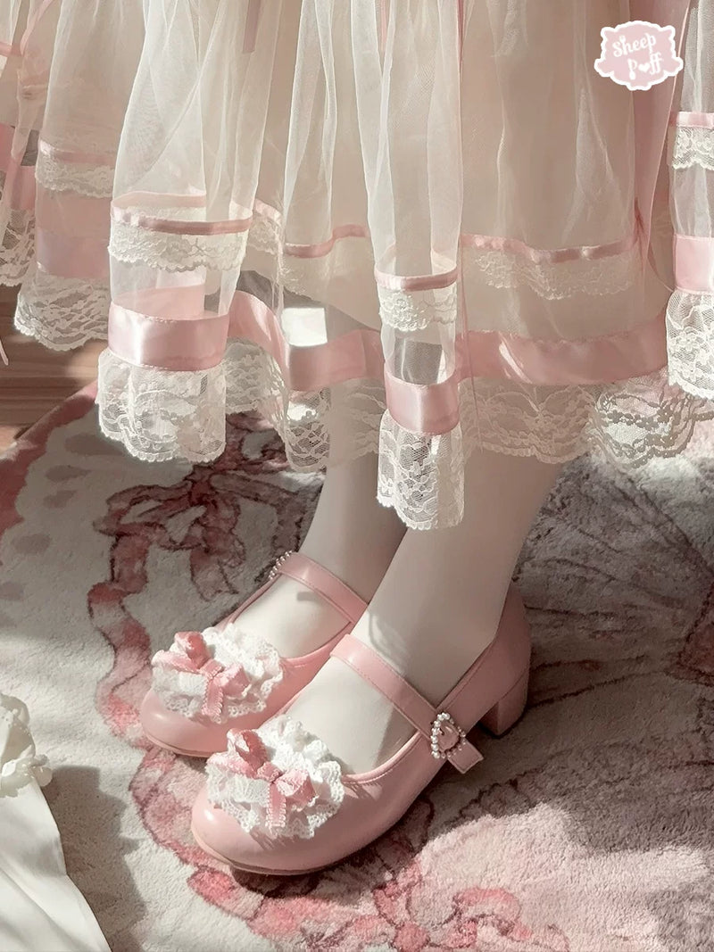 Sheep Puff Ballet Romance Lolita Shoes displayed in a soft pink color with bow embellishments and delicate detailing.