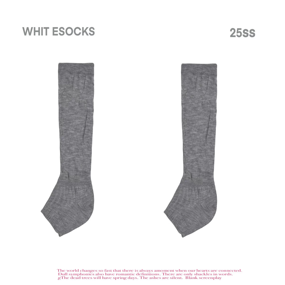 White Socks gray ruched stirrup mid-calf socks shown with a black slide