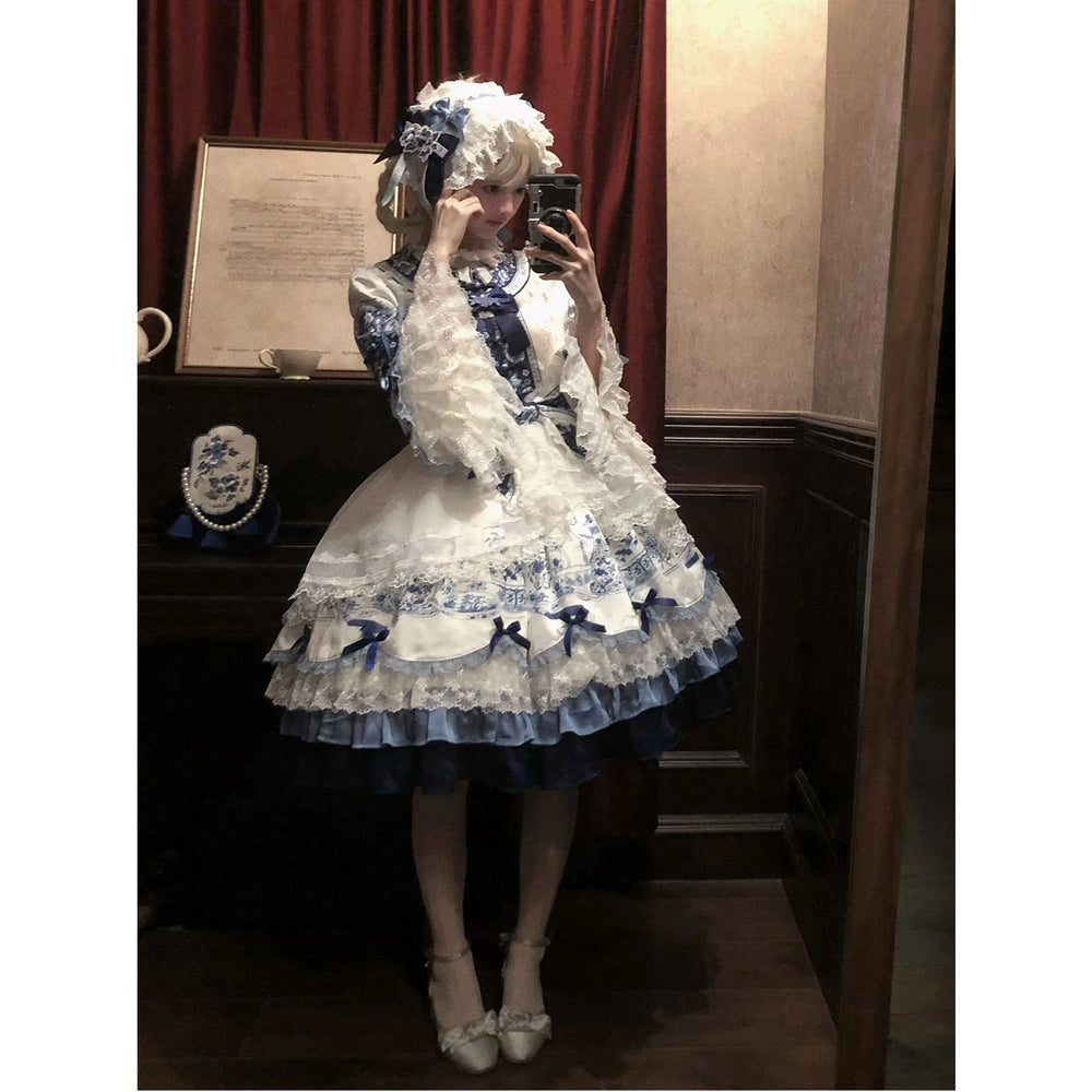 Creamy Blue Celadon white-and-blue dress with layered lace ruffles