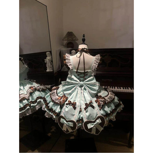 Creamy mint-and-chocolate JSK dress set with layered ruffles, lace trim and brown bows on a mannequin