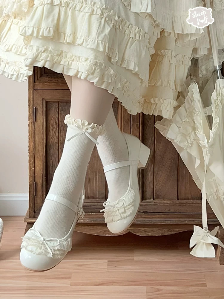 Sheep Puff Satin Cake Mary Jane Shoes with rounded toe and decorative bow, stylish footwear for casual or dressy occasions.