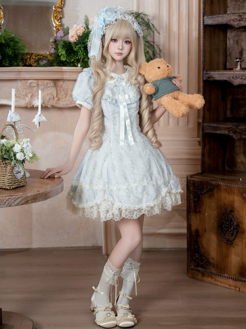 Coordinating pale blue and white Lolita headpiece with lace and ribbon embellishments