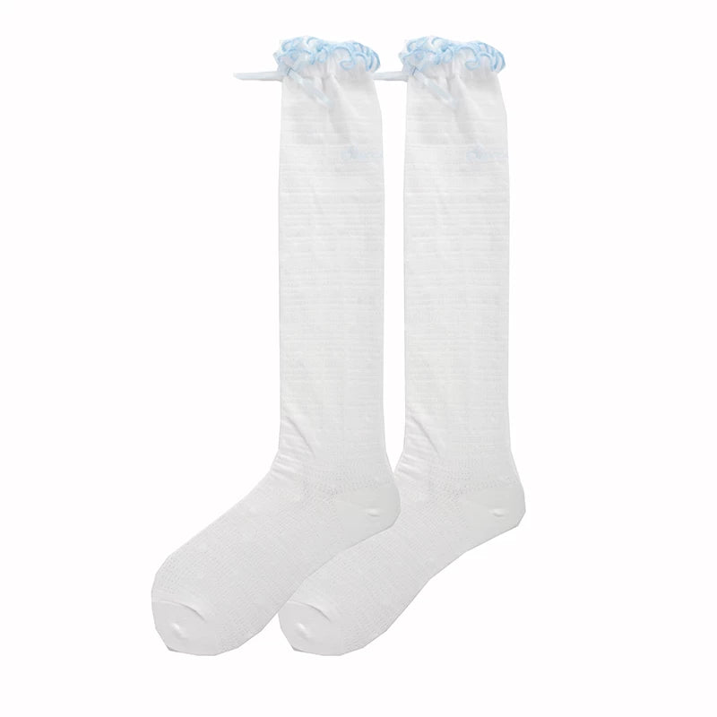 White short socks with blue lace cuffs, ribbon bows and a subtle polka-dot texture