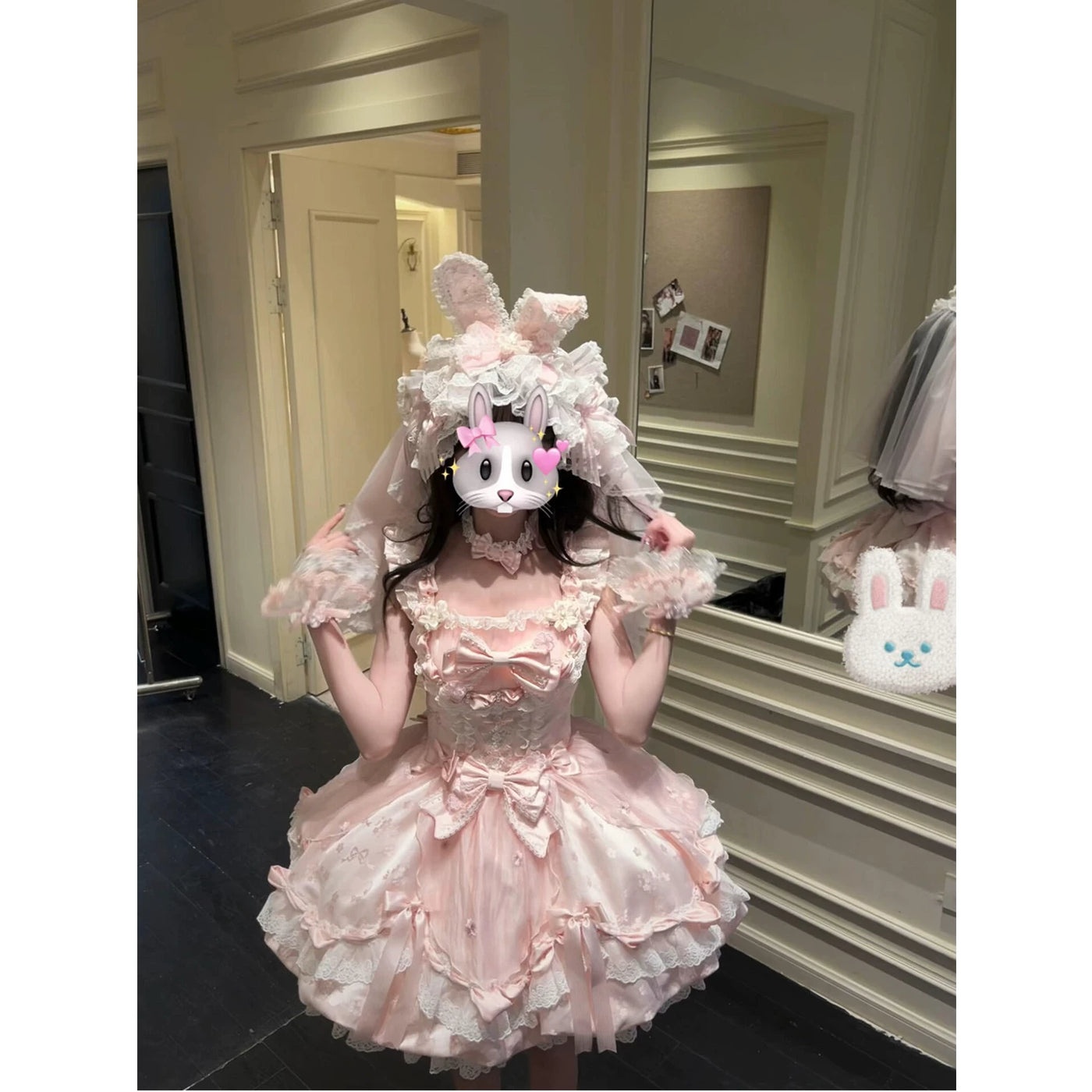 Tiered flared skirt of the pink sweet lolita JSK with lace hem insert.