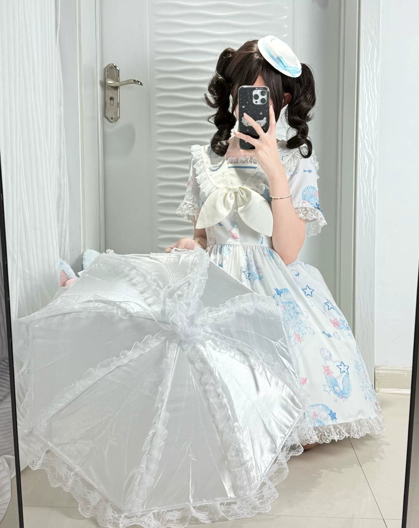 Pink Sweet Lolita parasol with scalloped lace trim and ribbon bow