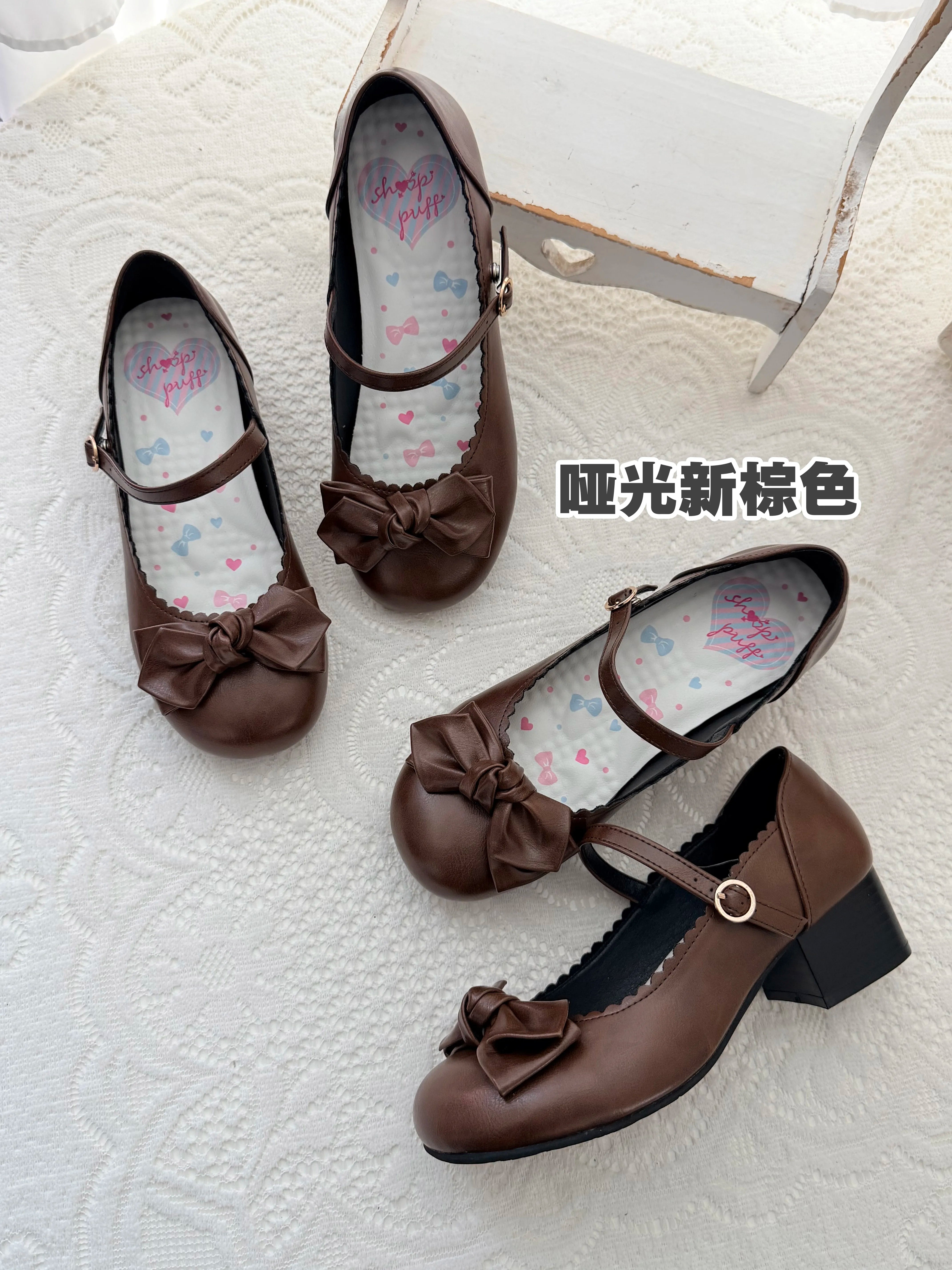 Sheep Puff Sakura Matte Lolita Shoes with rounded bow detail, soft pink finish, and classic shoe shape.