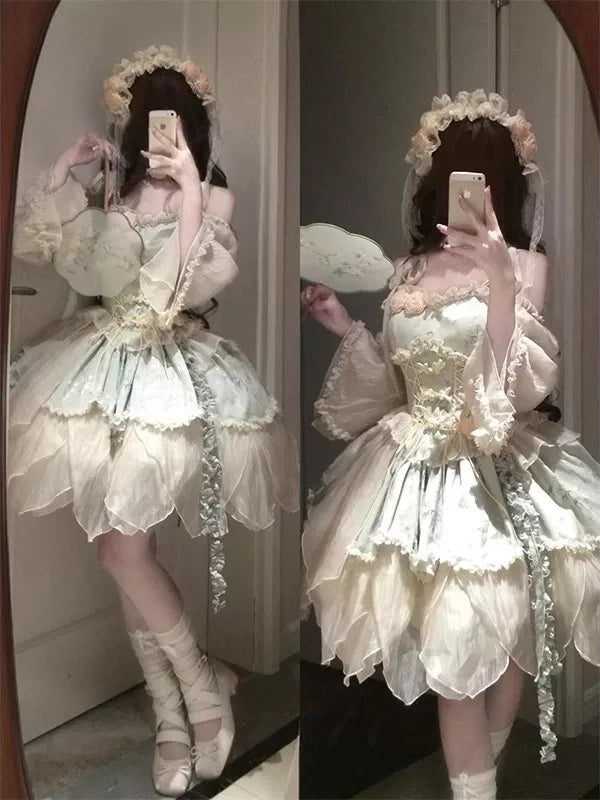 Front view of the green Lolita dress showing corset lacing and ruffled trim