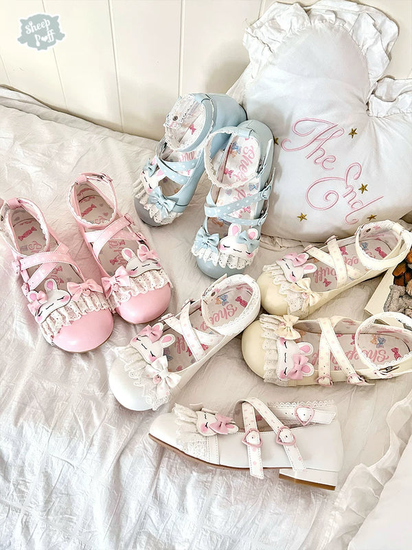 Sheep Puff Shy Bunny Lolita shoes featuring pastel pink color, bunny design, and decorative bows on a pair of stylish shoes.