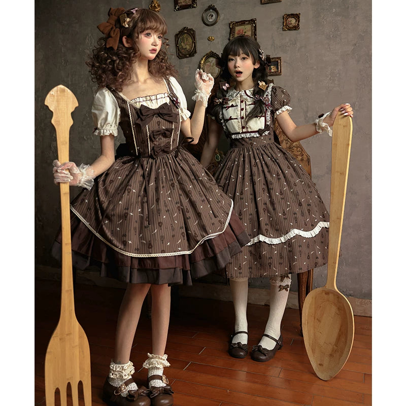 Moroccan Cocoa brown striped OP dresses with hot-air-balloon motifs and Peter Pan collars.