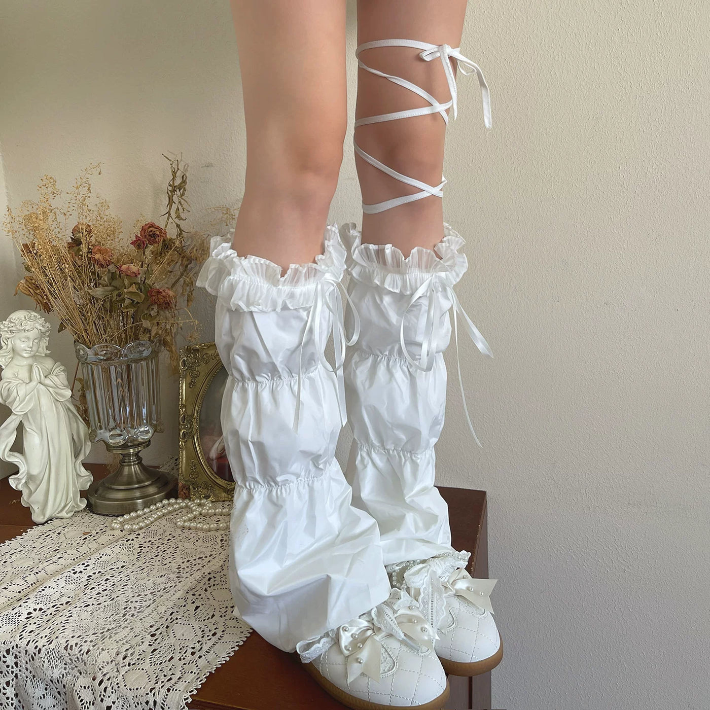 Over-the-knee gathered leg coverings with satin ribbon closures