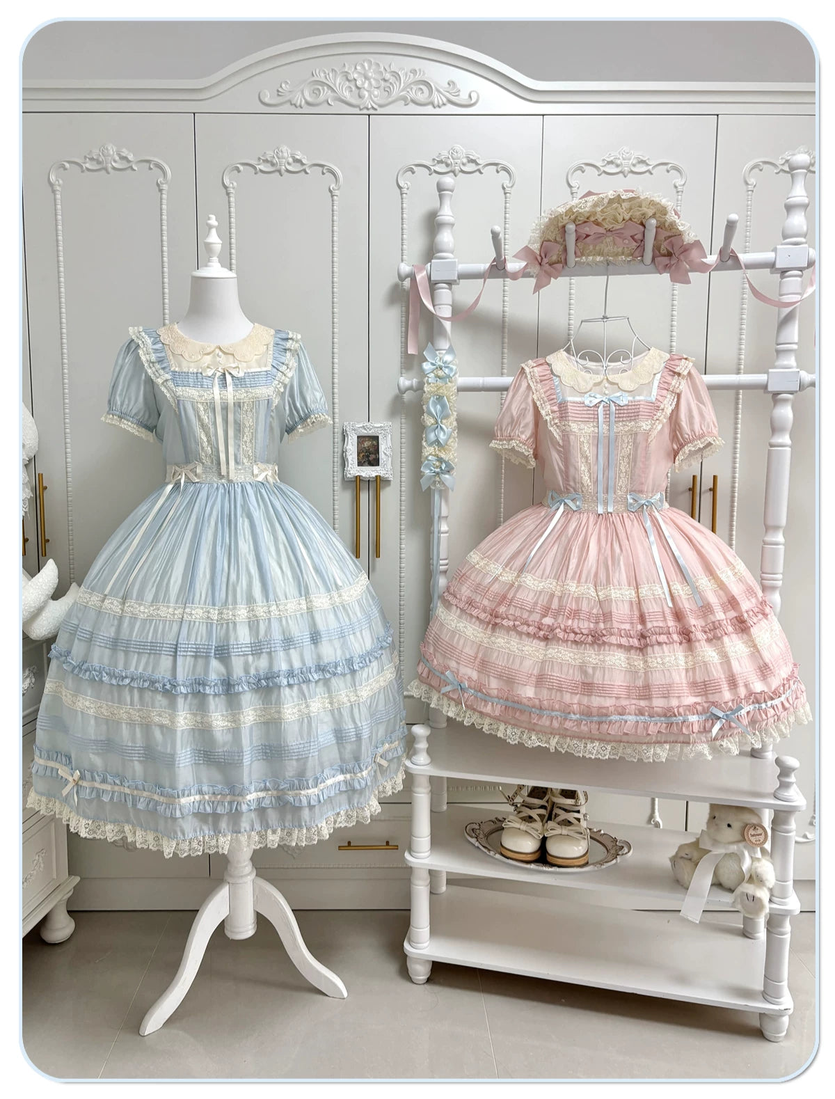 Pink and blue short-sleeve OP dresses with embroidered collars and layered lace skirts