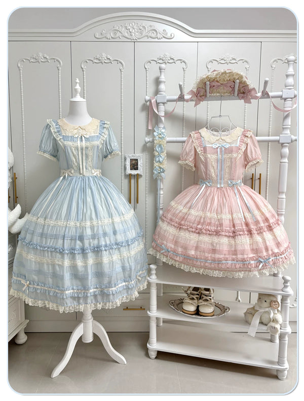 Pink and blue short-sleeve OP dresses with embroidered collars and layered lace skirts