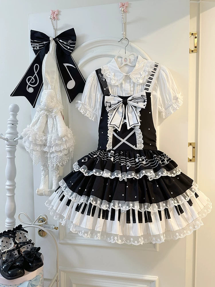 Black Candy Tree musical sweet Lolita JSK with piano key print on lower tier and contrast bow accents