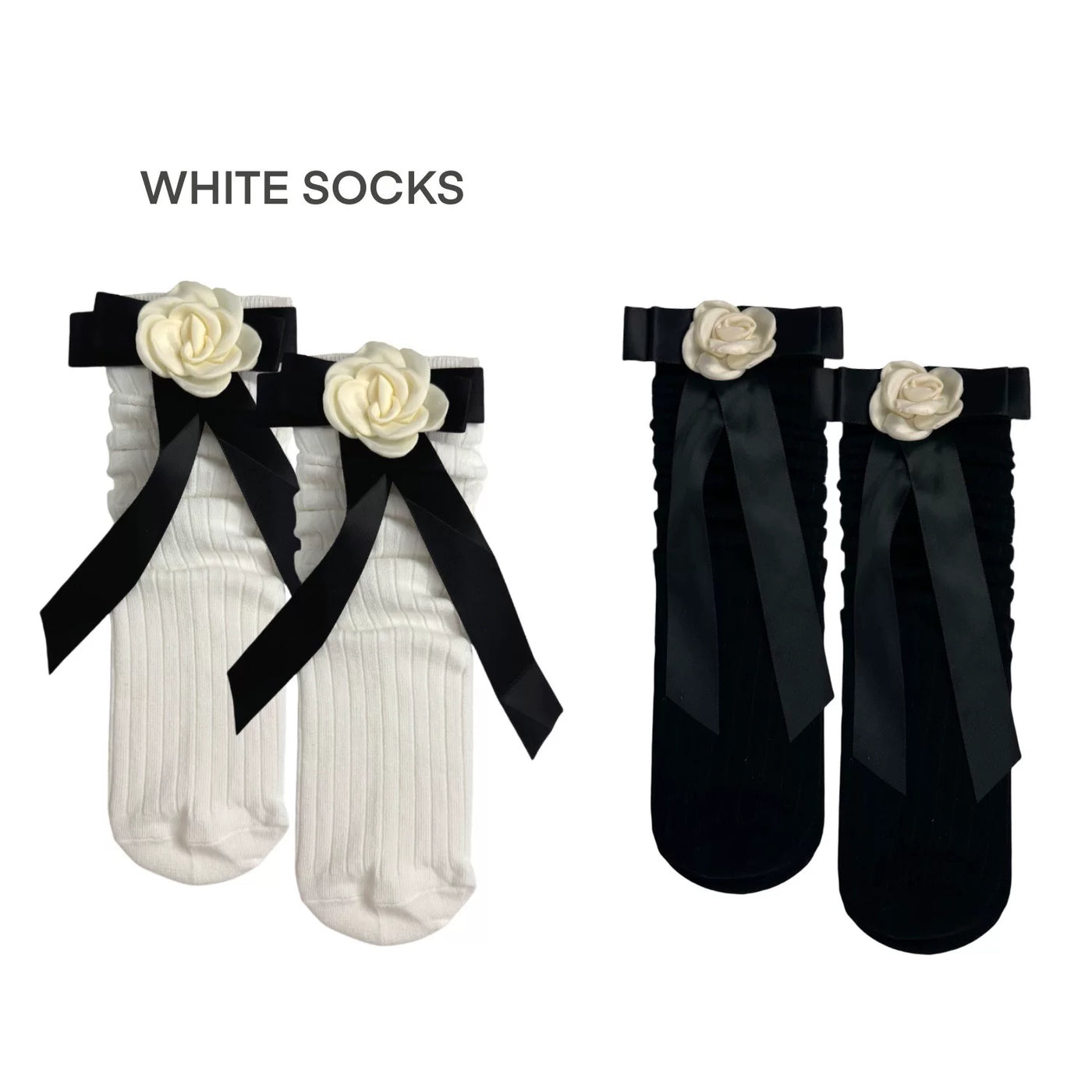 White and black slouch knee socks with floral accents and long ribbon details shown on model legs.