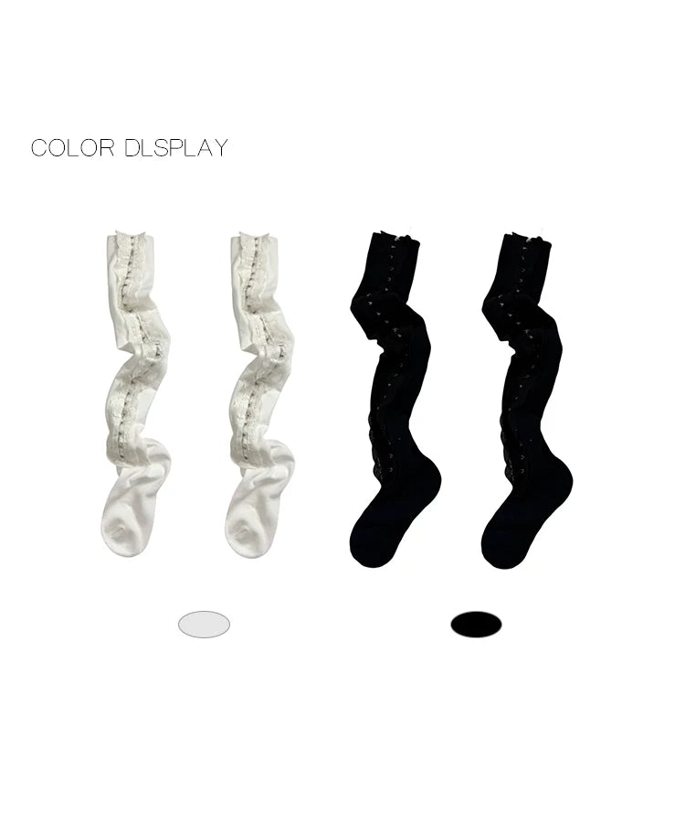 White and black lace-front thigh-high socks with hook details.