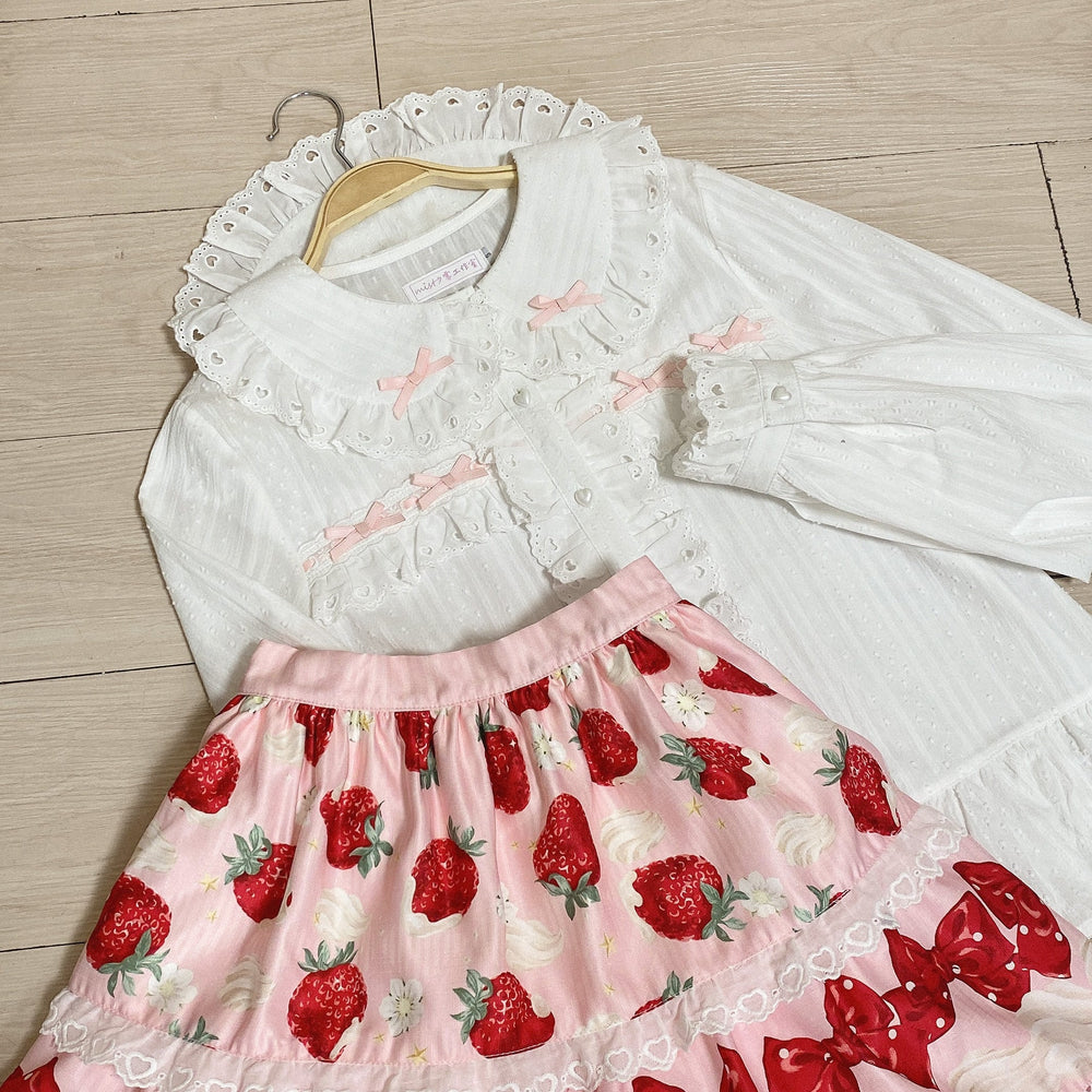 Black Sweet Lolita blouse with a doll collar and puff sleeves