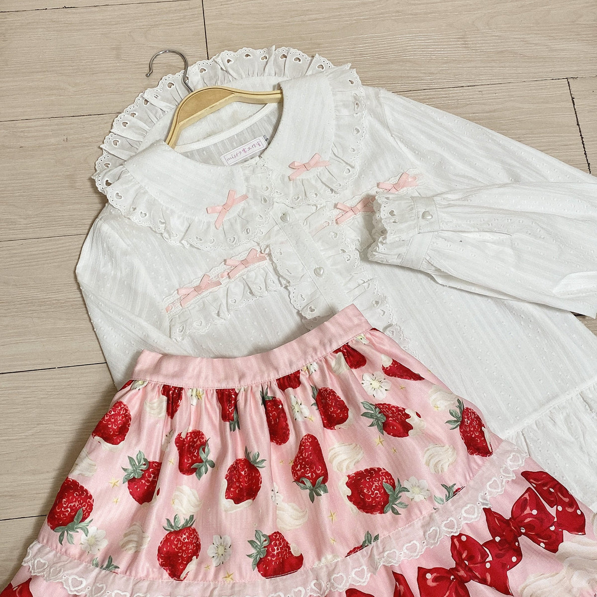 Black Sweet Lolita blouse with a doll collar and puff sleeves