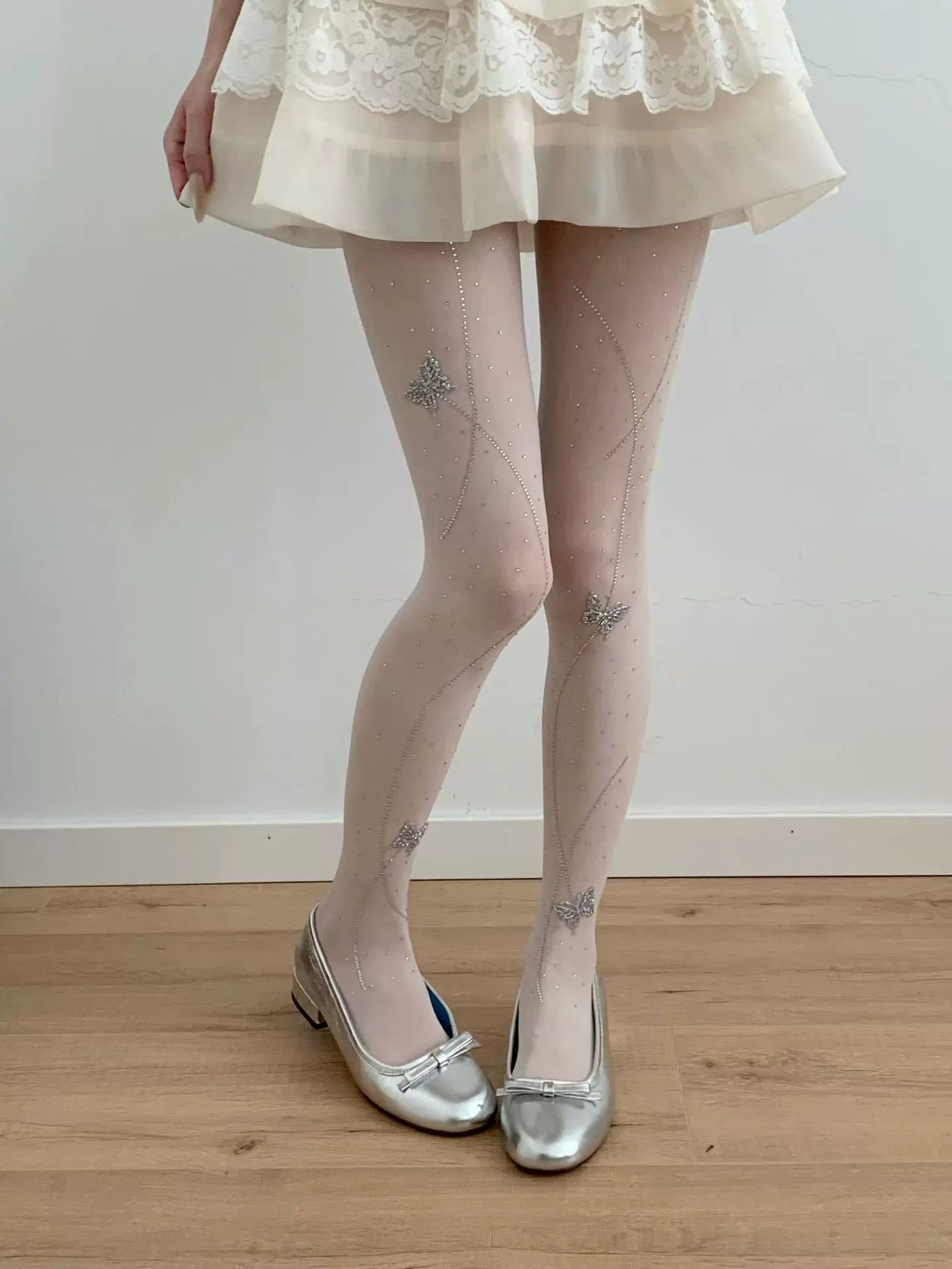 Ivory sheer lolita tights with rhinestone butterfly and line detailing