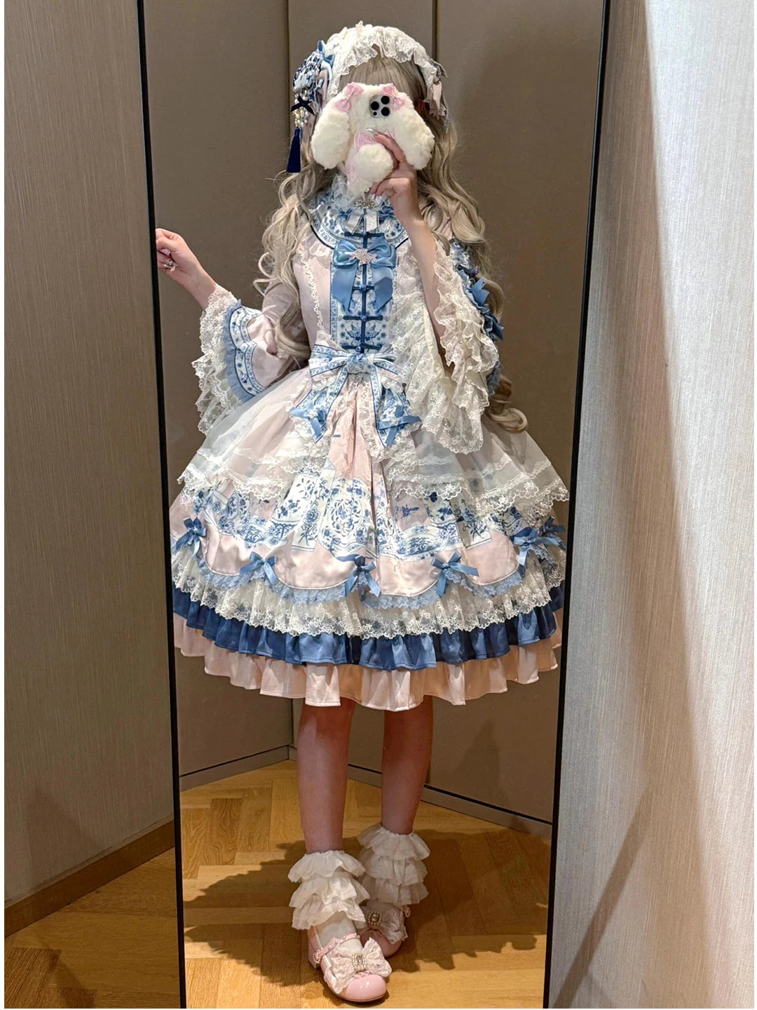 Pink and blue Chinese-style Lolita dress with porcelain-inspired panels and blue ribbon bows.