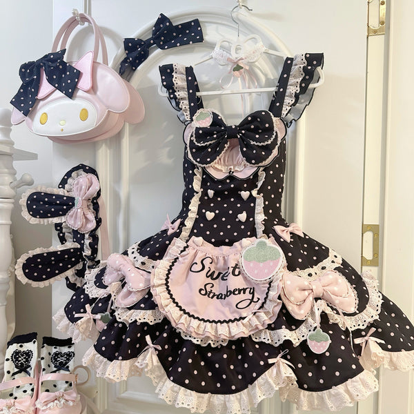Black-pink strawberry polka-dot JSK with layered lace and bow details on a hanger