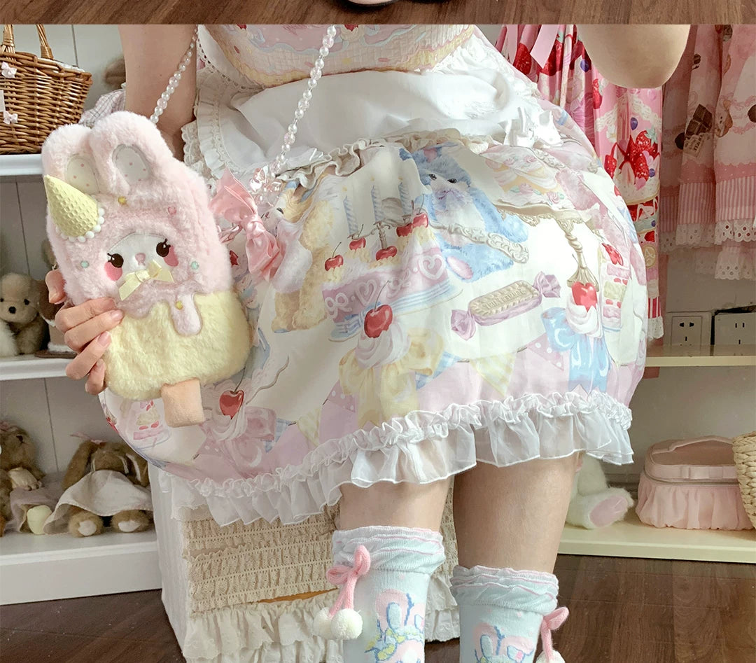 Pastel Momo short socks with lace ruffles and pom-pom ties arranged beside a plush bunny.