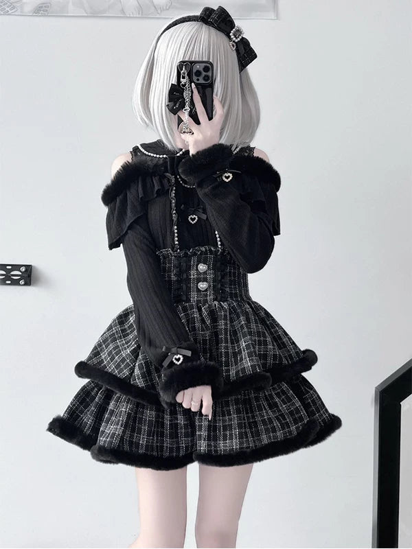 Black plaid knit top and tiered skirt set with plush trim