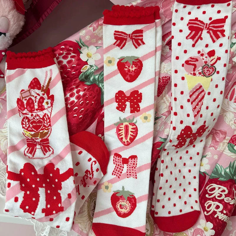 Milky Star Qiaoqiao strawberry and bow mid-calf socks in red, pink, and white