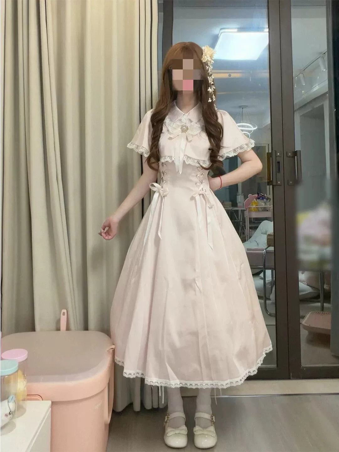 Pink Lolita long dress with lace-trimmed cape, waist ties and lace hem.