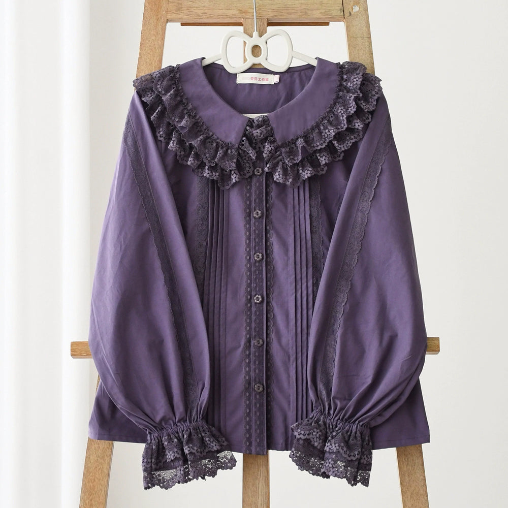 Purple long-sleeved Lolita shirt with lace trim, chest pleats, and gathered cuffs.