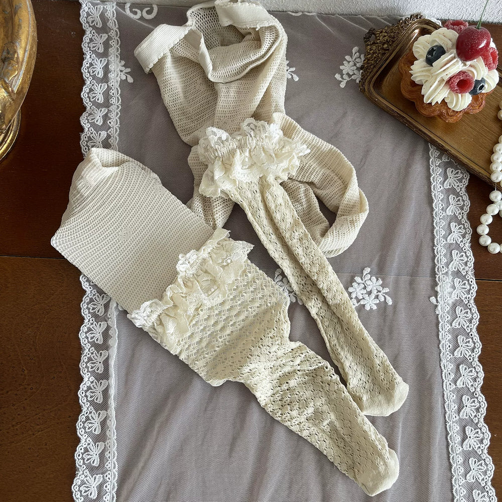 Sock Noble cream-beige openwork pantyhose with lace trim.